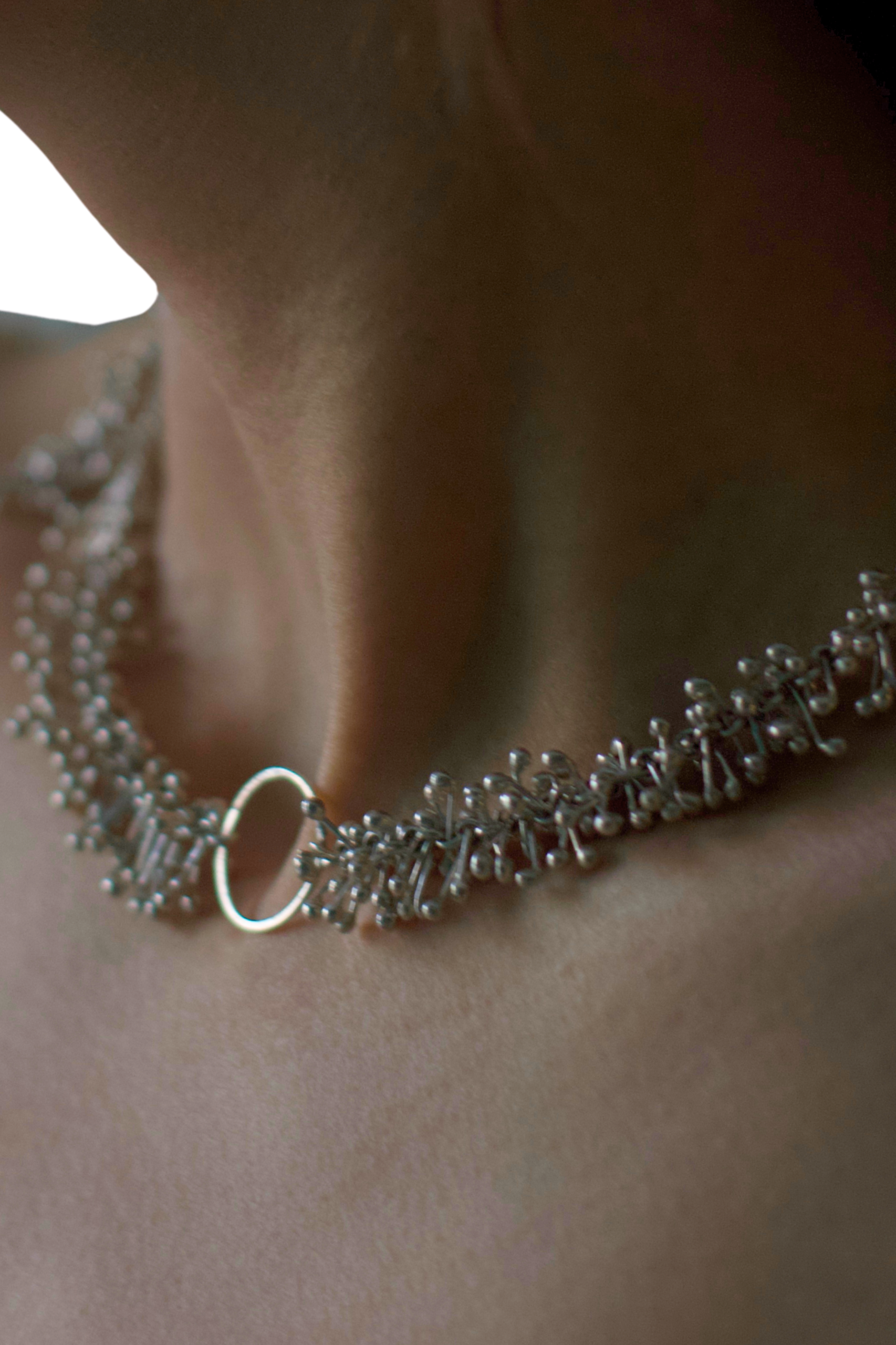 Grape Vine necklace by joola – hanGrape Vinedcrafted in 925 sterling silver with a rhodium-plated finish, inspired by the graceful rhythm of grape vines.